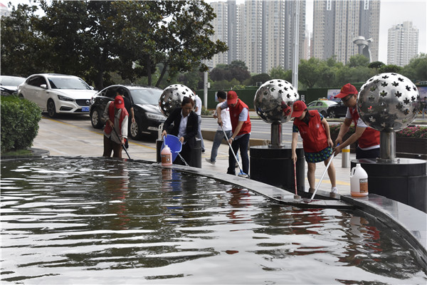 乐玩app入口站官网-乐玩中国联合商务区社区开展“清洁家园 美化社区” 主题志愿服务活动